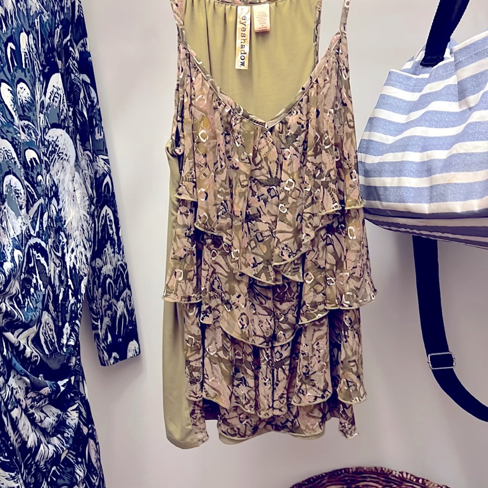 Layered front tank top with adjustable straps.